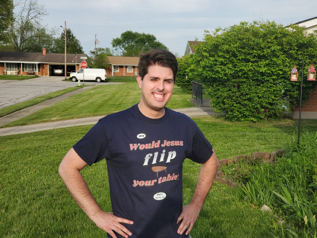 "Would Jesus flip YOUR table?" worn by a happy customer 